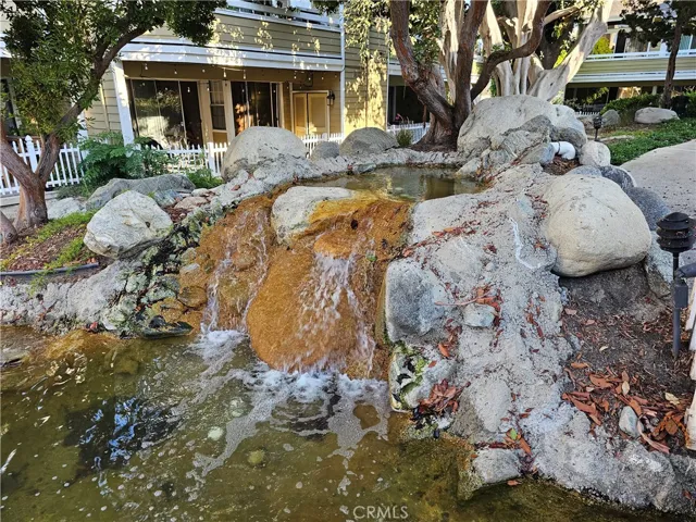 View of community interior; small rock waterfalls located throughout.