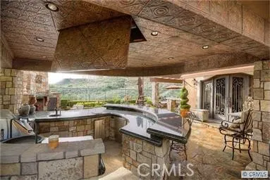 outdoor bar with drop down TV