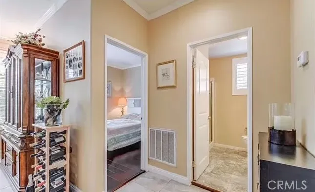 Downstairs (5th) Bedroom entrance with 3/4 Bathroom on the right