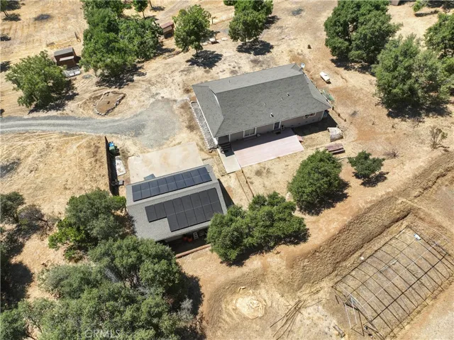House, garage and Hoop house.