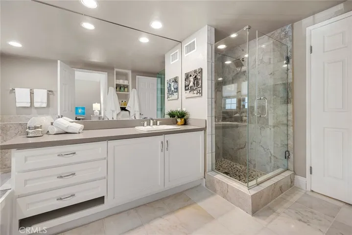 Secondary Suite has a Large Vanity & Shower too.