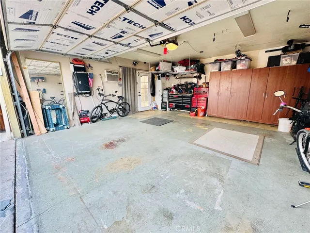 Two car garage with plenty of storage