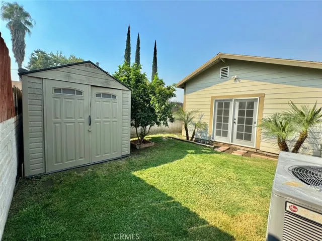 Back yard and storage shed.