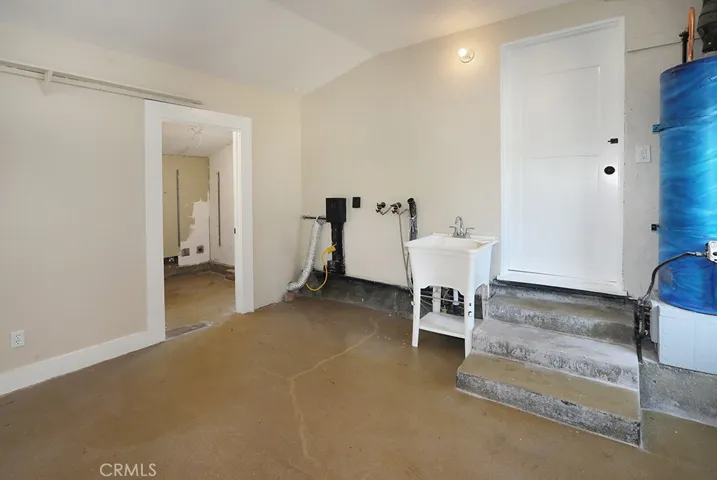 Bonus space includes washer and dryer hookups and sink