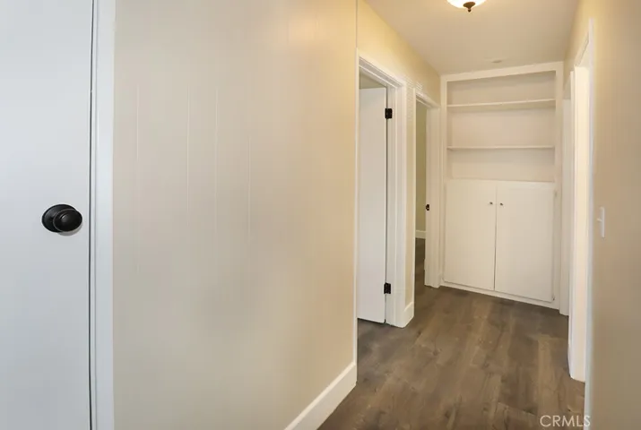 Interior hallway off 
entry that leads to 3 bedrooms and full bathroom