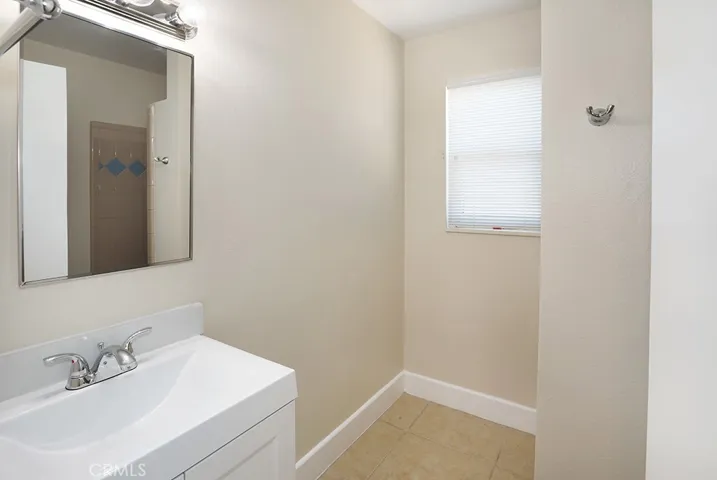 3/4 bathroom near 4th bedroom, dining room and kitchen