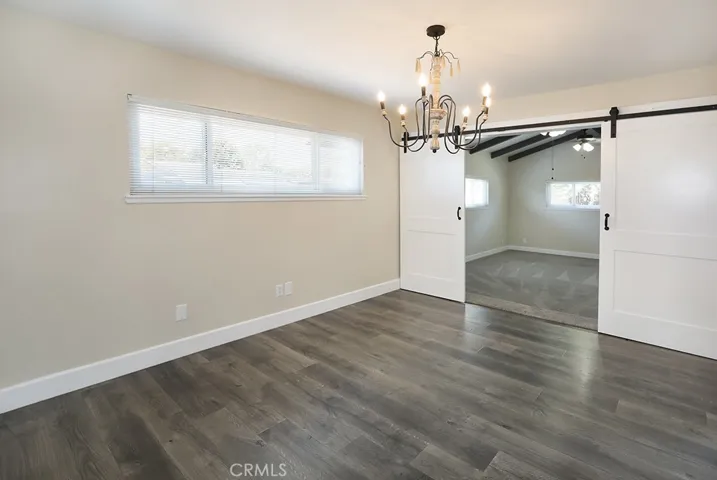 Alternate view of dining room/flexible space area opening to HUGE 4th bedroom.