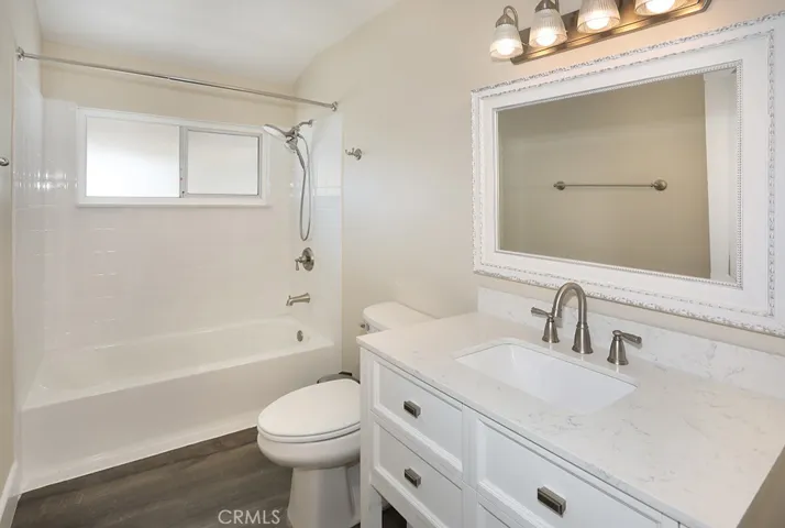 Updated hall bathroom that serves the 3 bedrooms