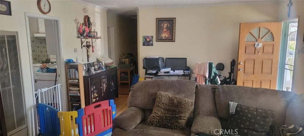 Front House 
Living Room w/ Hardwood Floors
