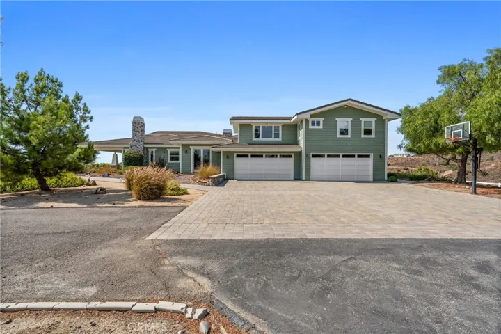 4 Car Garage and Large Driveway