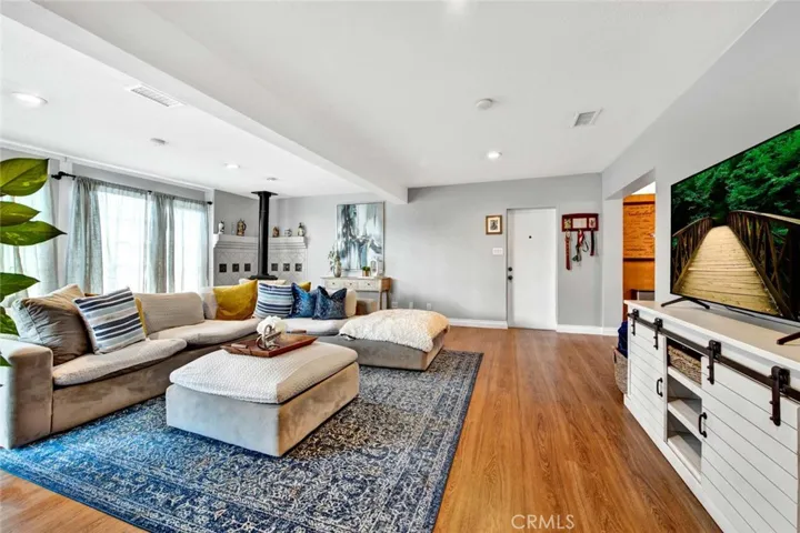 Giant Family Room (Enclosed Patio) Addition with Pot Belly Stove and Recessed Lighting