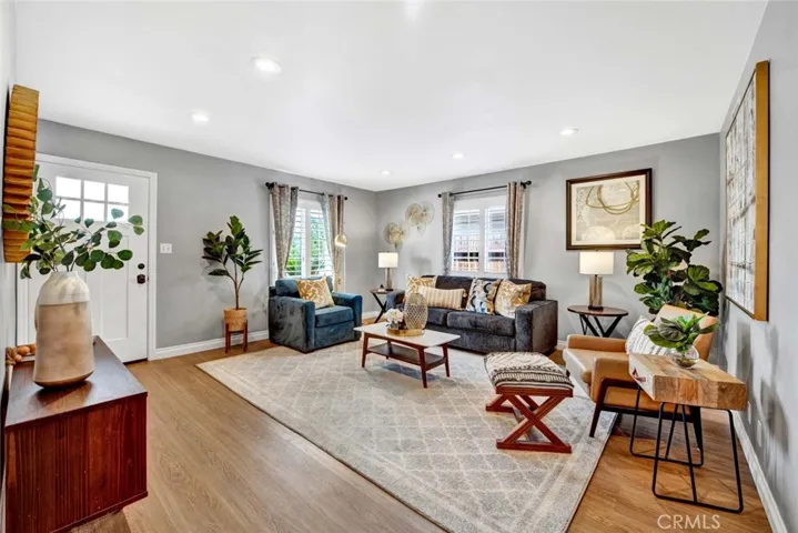 Entry door with Added Security Screen Door Opens to Gorgeous Living Room