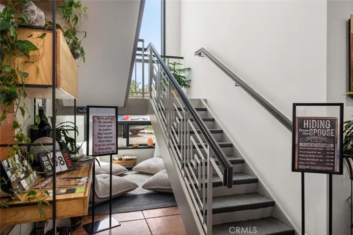stairs to 2nd floor lounge/apartment
