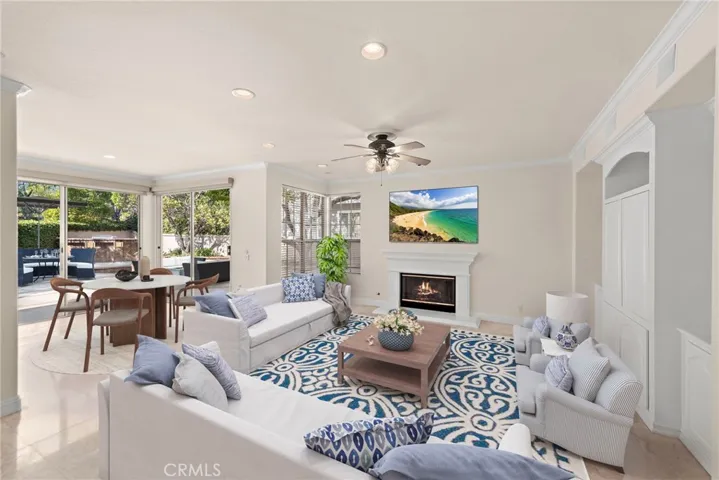 From the family room you have a spectacular view of the over-sized backyard or just enjoy casual relaxation (virtual​​‌​​​​‌​​‌‌​​‌​​​‌‌​​​‌​​‌‌​​‌‌​​‌‌​​​​ staging)