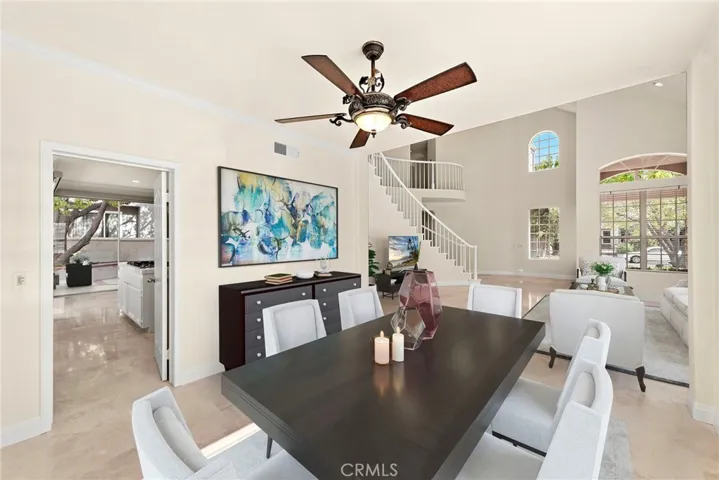  This home is an entertainer's dream with vaulted ceiling, abundance of light and the natural flow between the dining/living area into the family room/kitchen area (virtual staging)