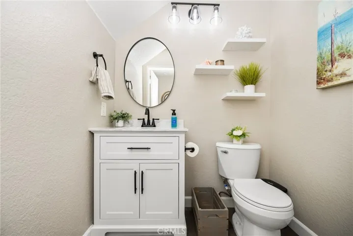 The downstairs guest powder room with newer cabinetry!