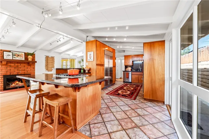 Incredibly beautiful Mahogany kitchen cabinets. Over-sized island with built-in wine frig.