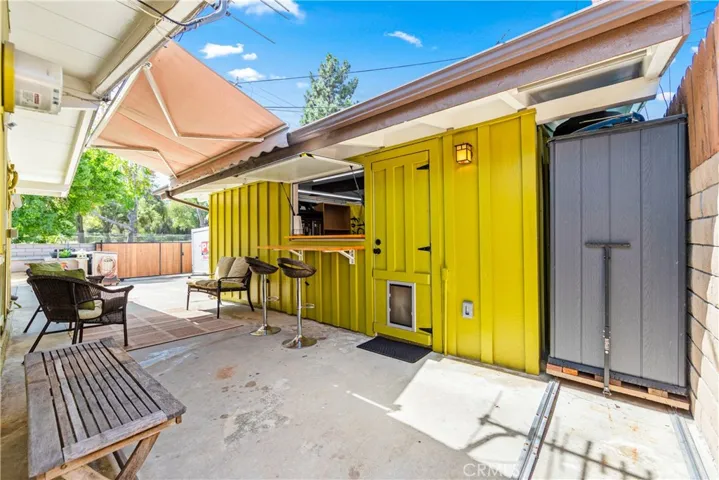 Looking towards the "concession stand" bar and garage door