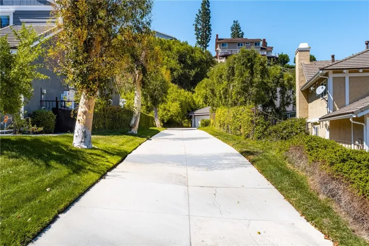 Enter from this Long Private Driveway to Your Privacy and Serenity!