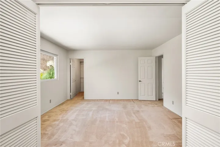 Primary Suite Sitting Room with a Walk-In Closet (this could be a 6th Bedroom).