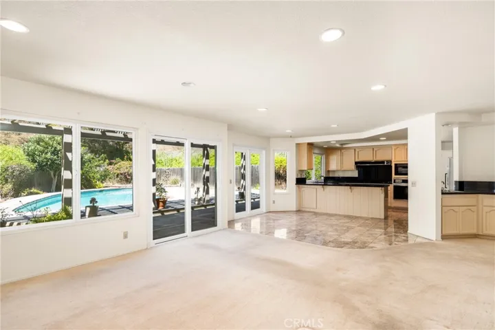 Another View of the Family Room Opening to the Kitchen and Informal Eating Area