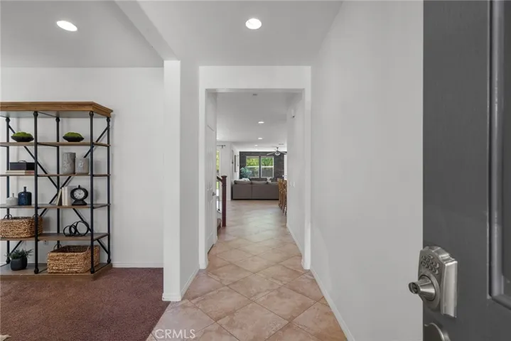 enter to tile flooring and plenty of natural light