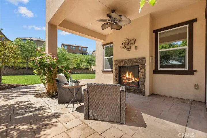 backyard outdoor covered california room with fireplace