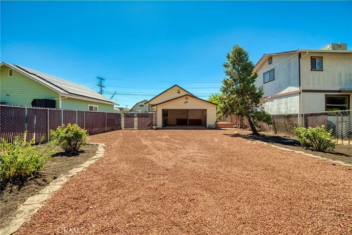 2 car garage and plenty of room to park boat trailer, RV, and all your toys.