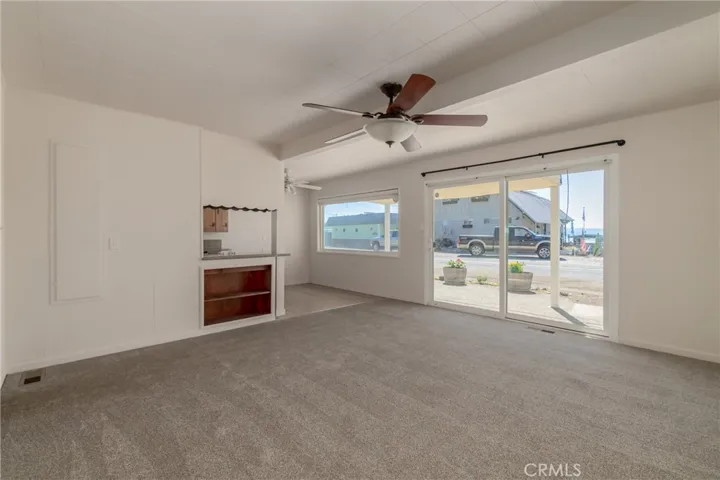 Living room with new carpet and paint.