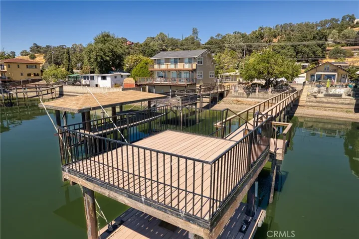 Wonderful sundeck with rod iron rail.