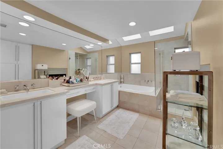 Primary bathroom with fireplace bath/shower