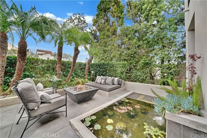 Dining & lounging with Koi pond in front yard area