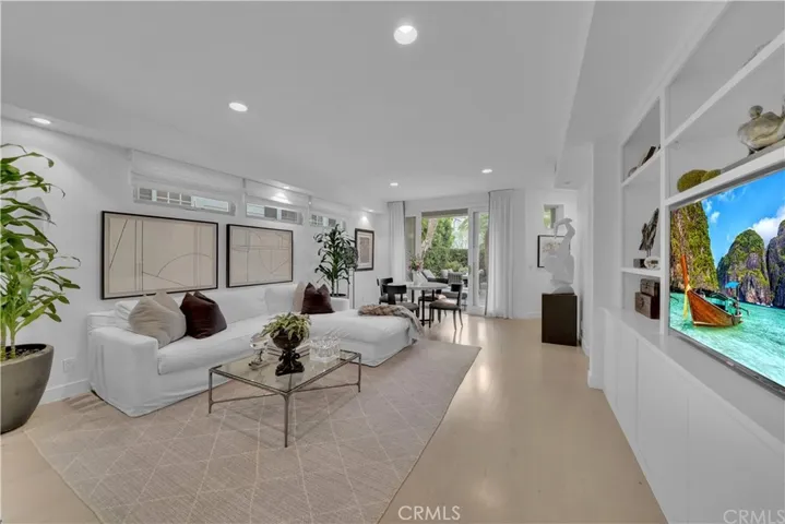 Stylish, open & bright living room with dining that opens to front yard with sliding doors-indoor outdoor living
