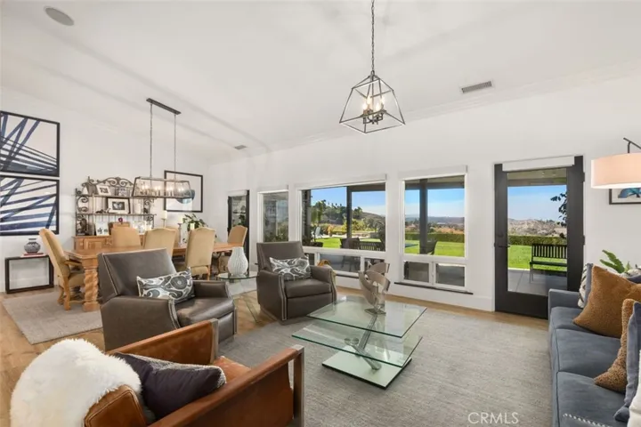 Open front room/dining room layout with scenic views.