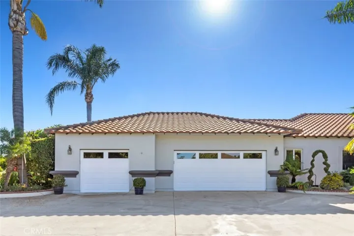 Three car garage with two garage doors.