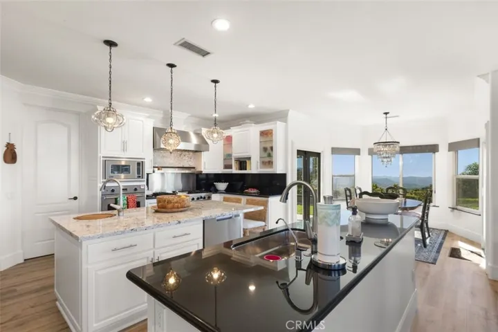 Working from kitchen sink, you can take in views to the front and side.