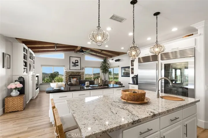 Spacious layout with abundance of light in kitchen and family room.