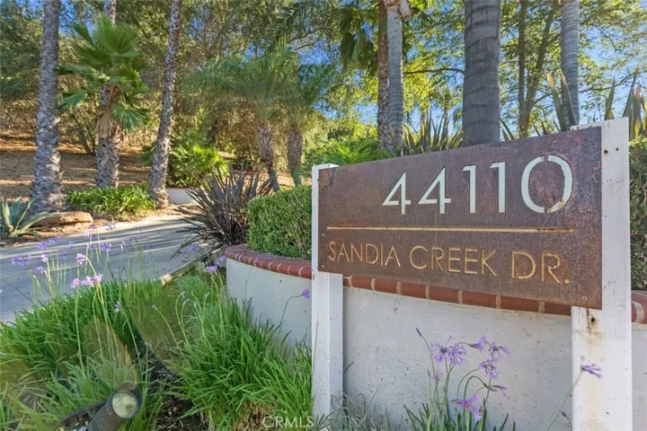 Sign at the bottom of the driveway.