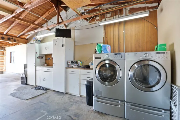 Laundry and storage located in the garage