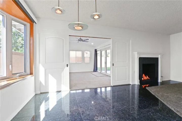 Dinning area with bonus room doors open