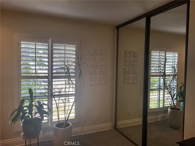 Secondary bedroom with closet