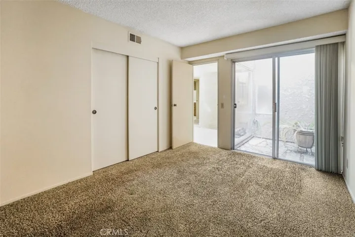 The second bedroom has access to the atrium.