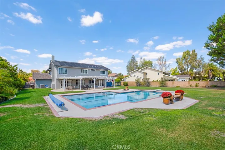 Backyard with Pool with Two Swim lanes-Baja Shelf-Diving Board- Fire Pit