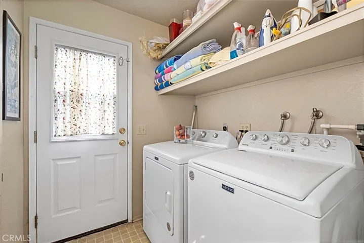 Inside Laundry with access to backyard