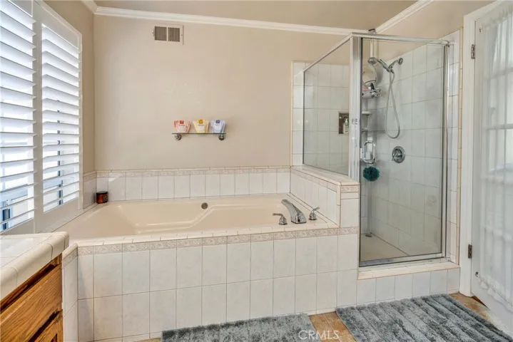 Extra long jetted tub & stall shower