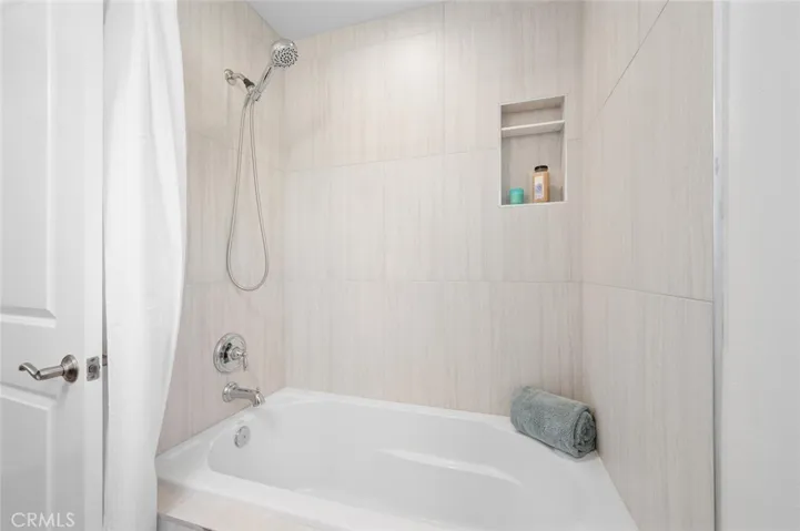 Secondary bath has oversized tub