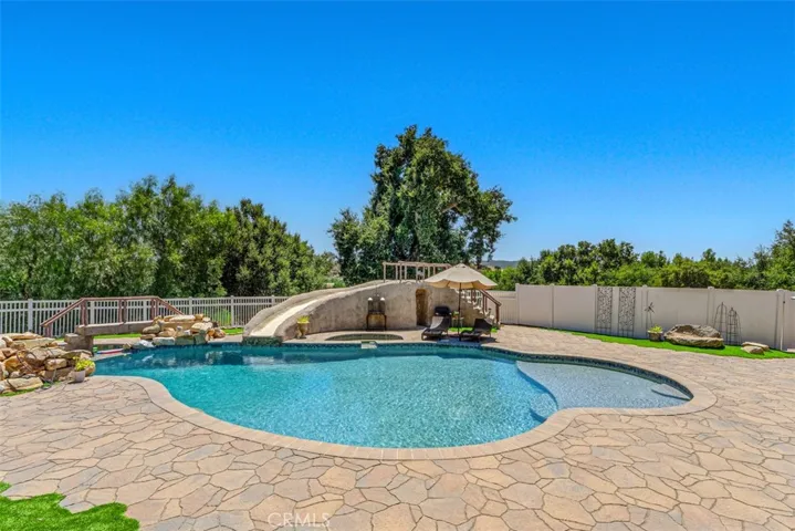 Pebble Tec Pool With A Water Slide