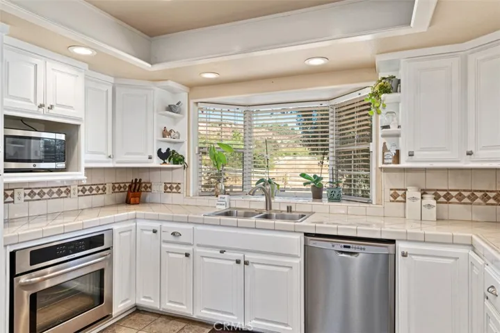 White Cabinets & Stainless Steel Appliances