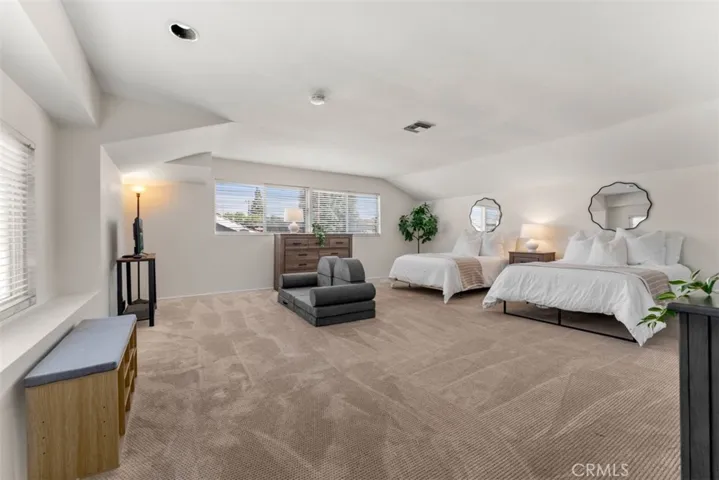 Spacious upstairs bedroom, versatile enough to serve as a bonus room, playroom, game room, home office, or make it into an ADU!