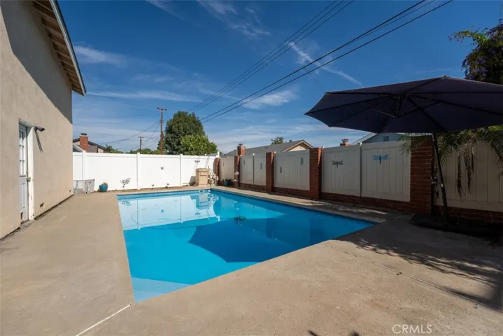 Dive into relaxation with this large pool perfect for for lounging, sunbathing, and hosting gatherings.